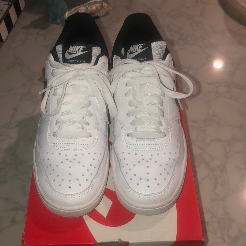 Nike Woman’s court vision low White and Black Sneakers